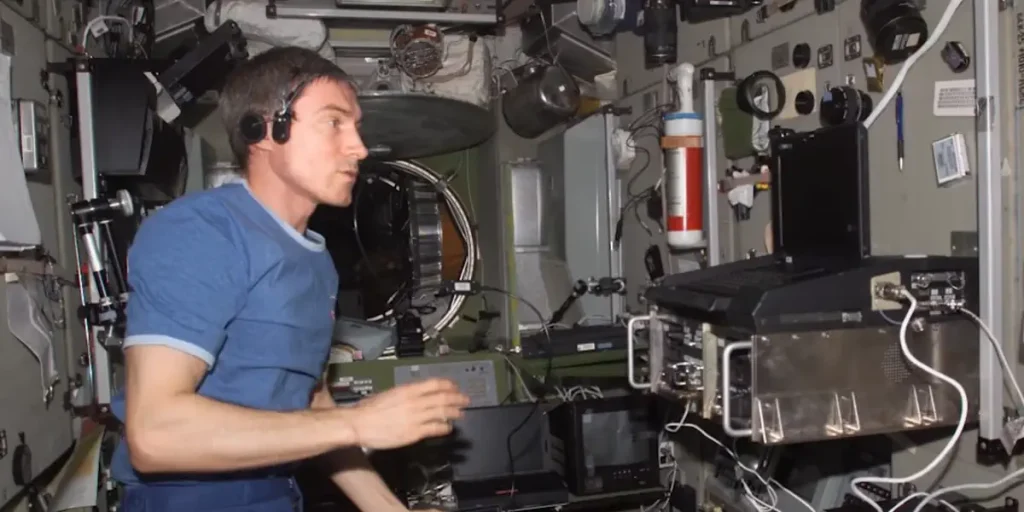 Sergei Krikalev aboard Mir, performing radio communications