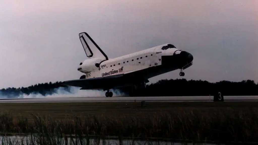 Space Shuttle Atlantis touches down at the Shuttle Landing Facility at the conclusion of the STS-74 mission