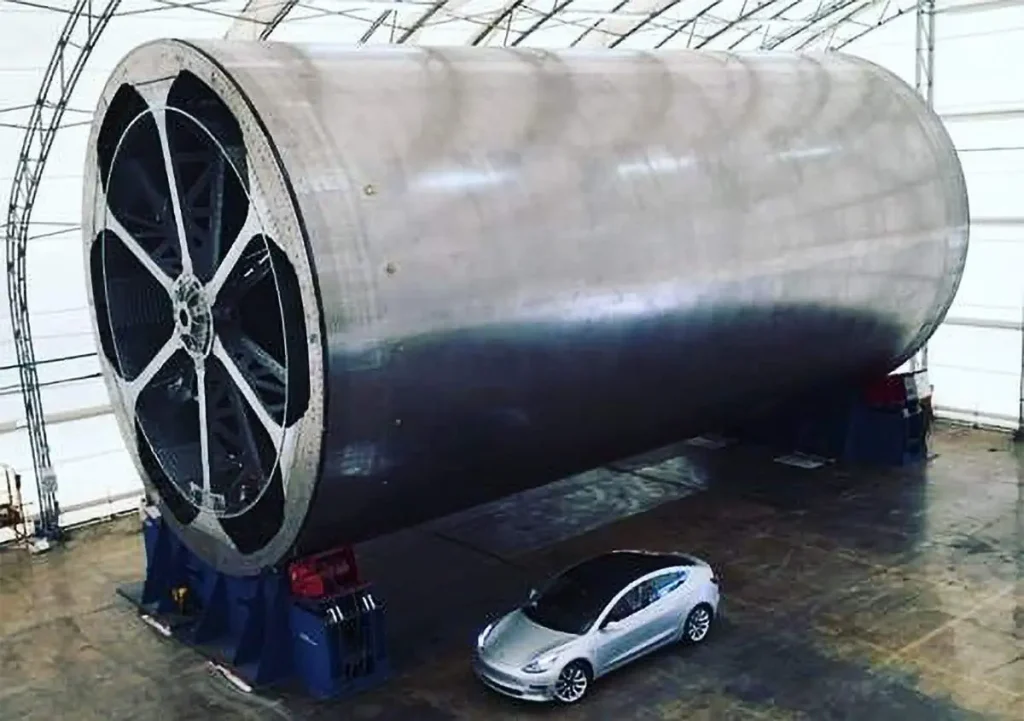 A huge carbon-fiber cylinder. SpaceX built this large mandrel for creating the carbon fiber body sections of the rocket that will boost Starship